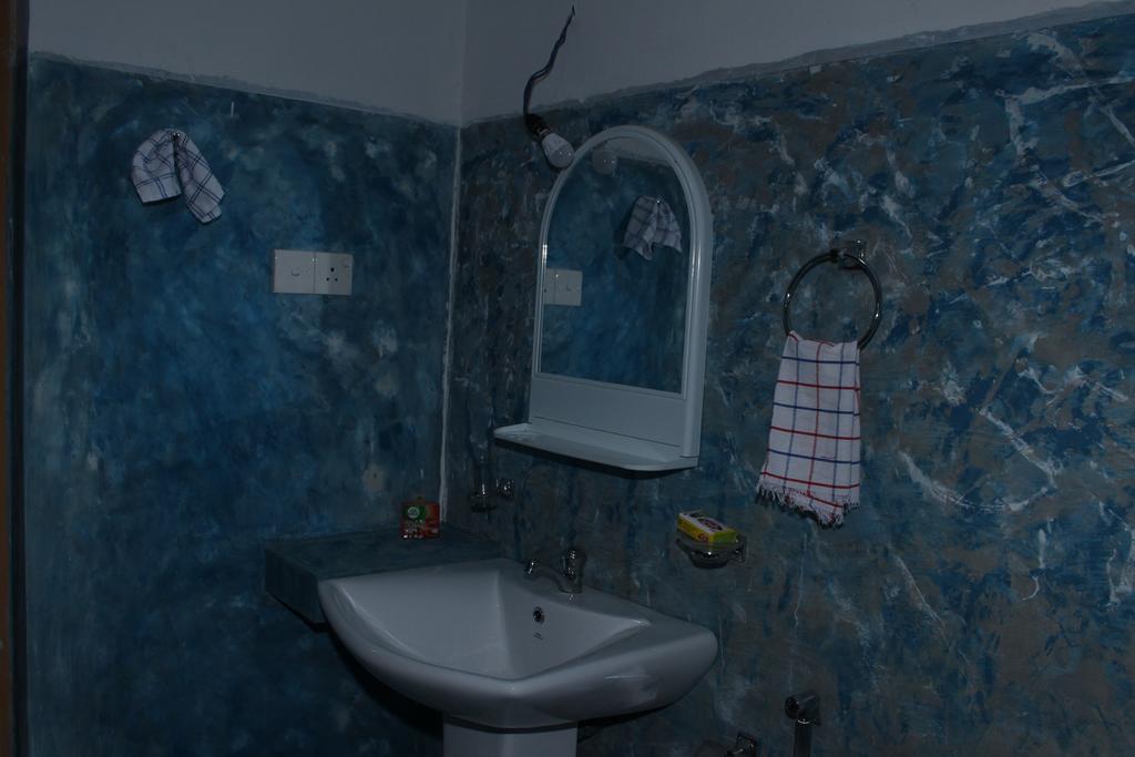 מידיגמה איסט Abberny Villa חדר תמונה