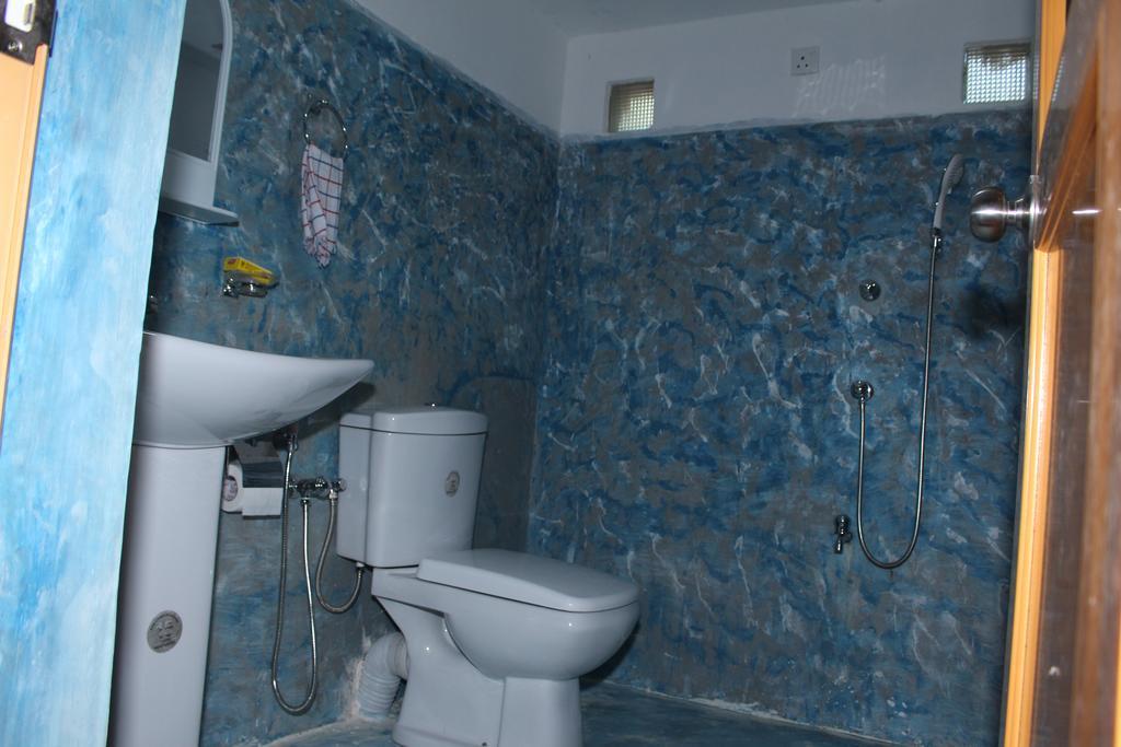 מידיגמה איסט Abberny Villa חדר תמונה
